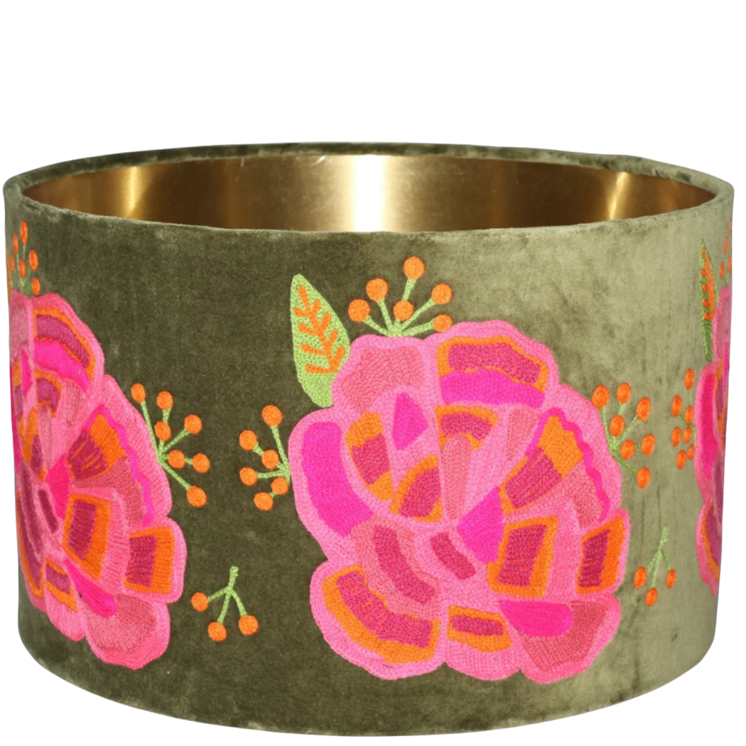 Green velvet drum lamp shade adorned with pink ranunculus flowers, adding a vibrant touch to any decor.
